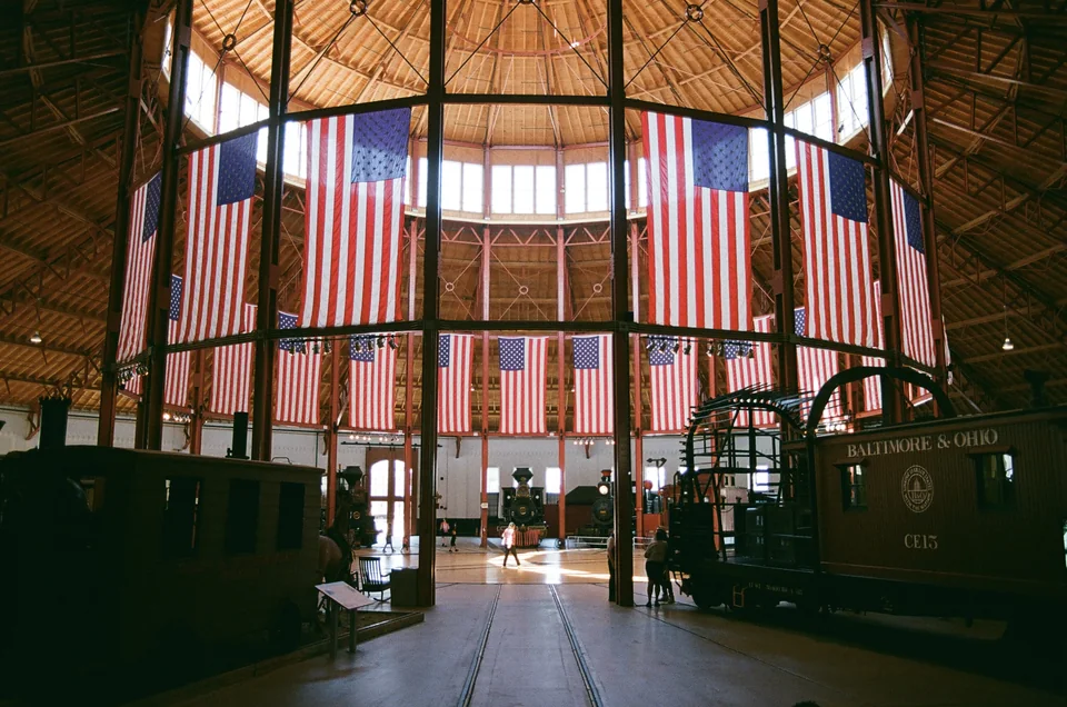 Historic trains inside the roundhouse at the National Museum of Railroad History and Innovation, formerly the B&O Railroad Museum